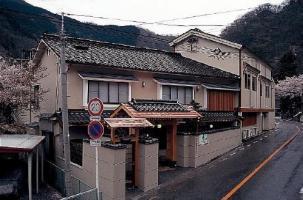 Отель Yunokura Tsuruya Maniwa Экстерьер фото
